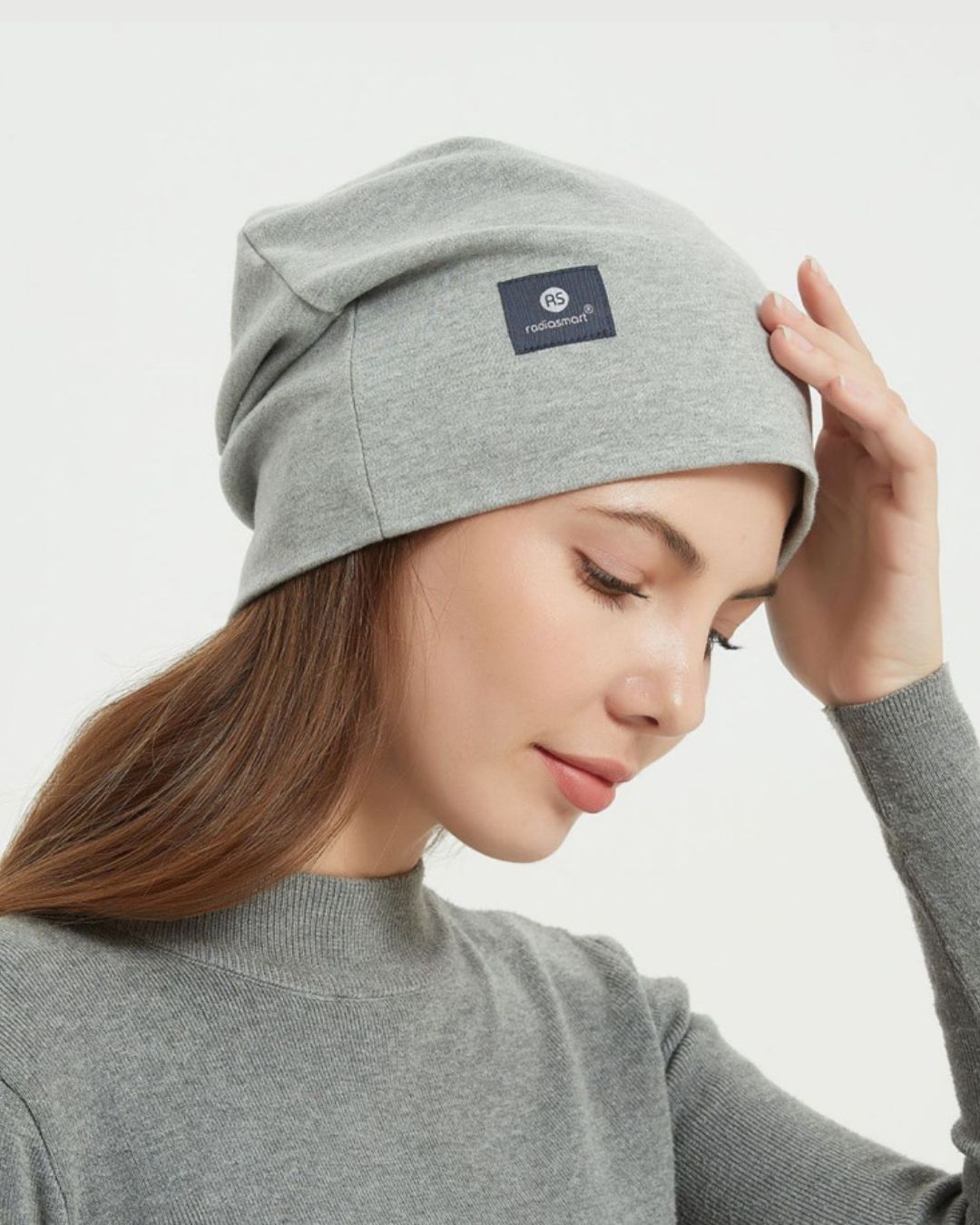 The Radia Smart® Slouch Beanie (Grey) offers EMF protection with silver-lined Faraday fabric that blocks RF, 5G, and wireless radiation. Designed to support fertility and overall wellness, this anti-radiation hat is soft, breathable, and stylish for everyday wear. It helps reduce exposure to harmful frequencies while providing comfort and peace of mind. Perfect for health-conscious individuals seeking modern protection in a relaxed, casual design.